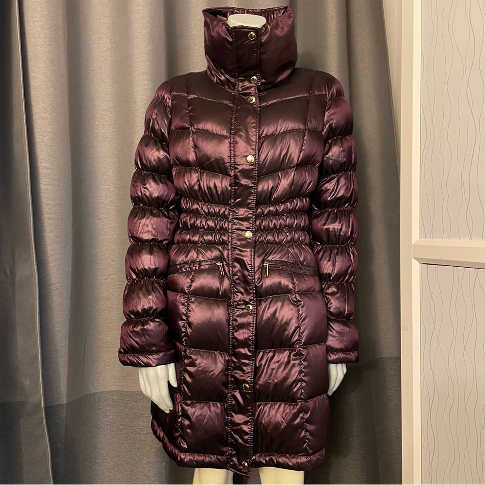 Like new Michael Kors packable down jacket in beautiful eggplant colour.  Size M